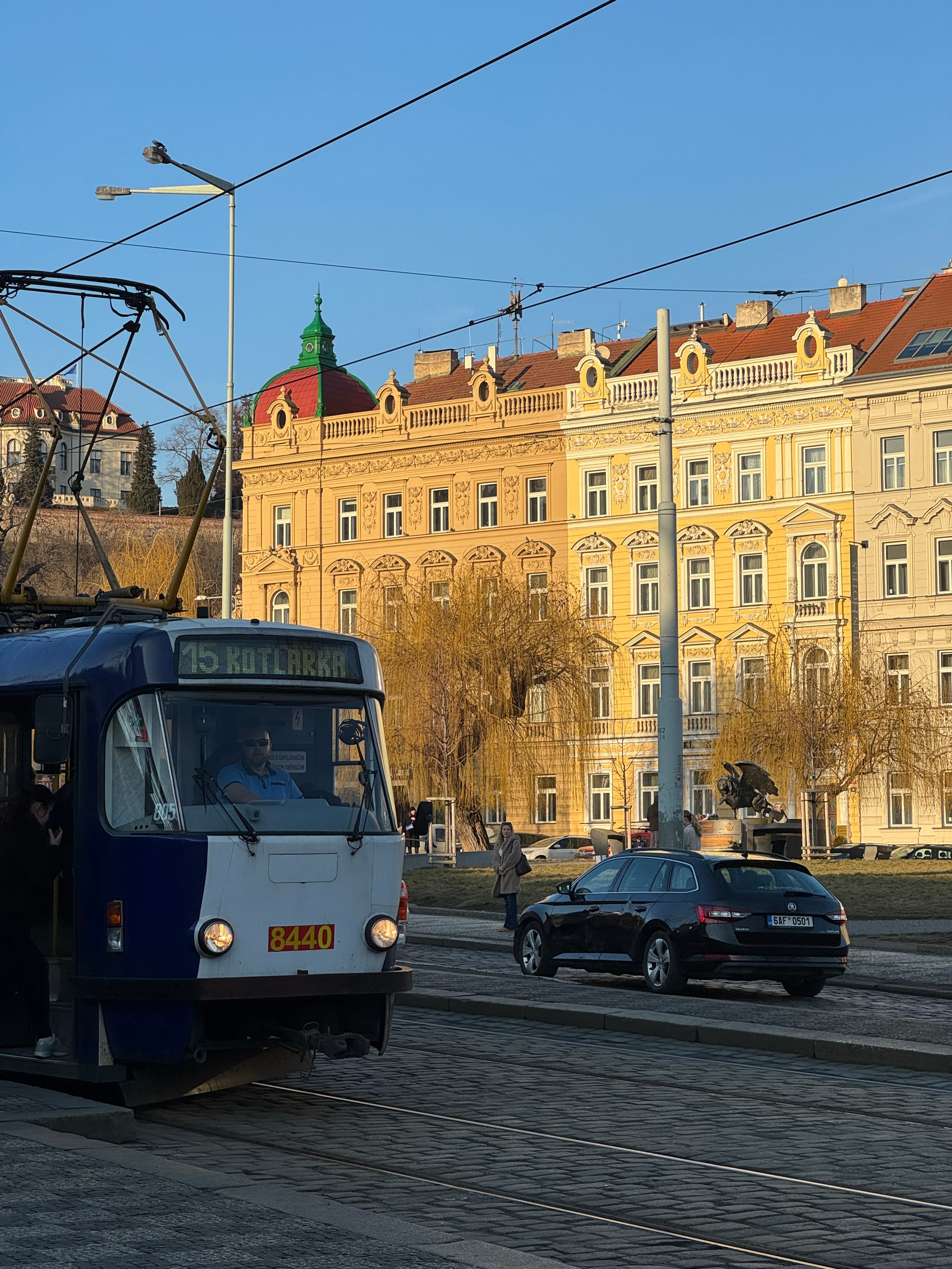 Tram in Prague, with sunshine